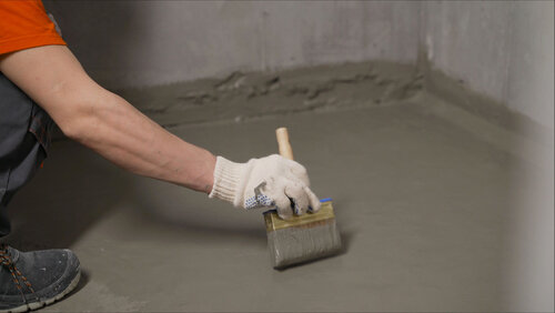 Worker Doing Cementitious Waterproofing | UltraTech Cement