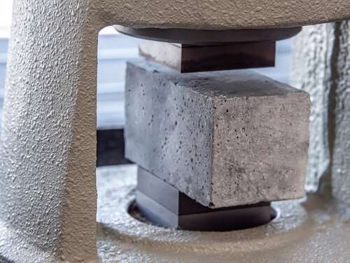 Concrete Block On Strength Testing Machine | UltraTech Cement