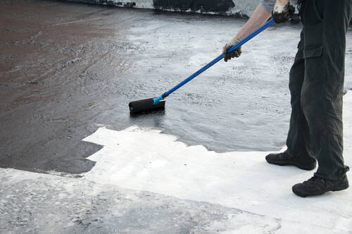 Worker Doing Bituminous Coating | UltraTech Cement 