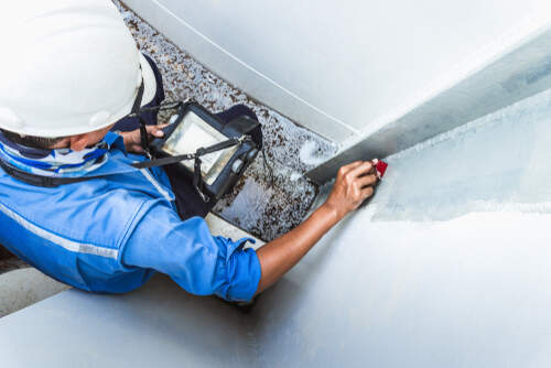 Worker Checking Ultrasonic Pulse Velocity In Wall | UltraTech Cement