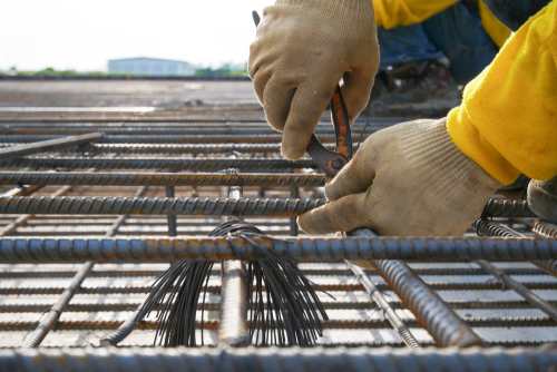 Worker Placing Reinforcement Bars For Stepped Footing | UltraTech Cement