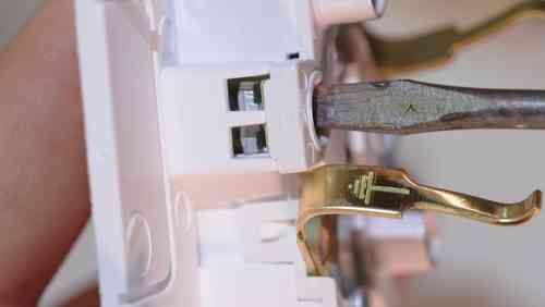 Installing Electrical Outlet with Screwdriver | UltraTech
