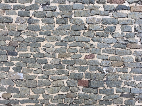 Coursed Rubble Masonry Stability and Design Flexibility