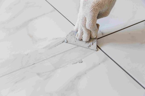Grouting the joints of the tile | UltraTech Cement