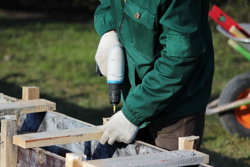 Worker setting up formwork for Centering Work  | UltraTech