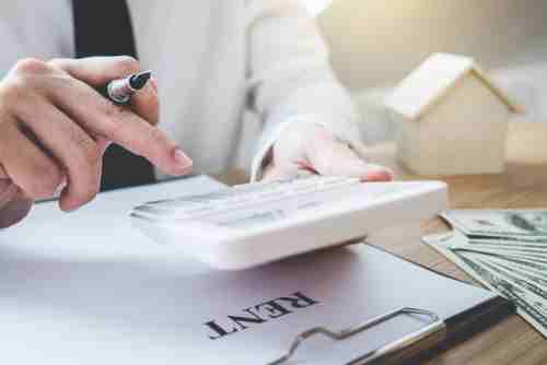 Team of engineers discussing labor costs in house construction budget | UltraTech