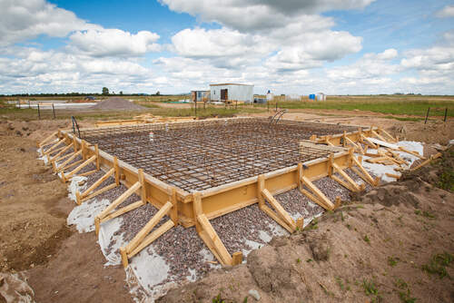 The foundation of the house. Pouring the foundation for a new building.