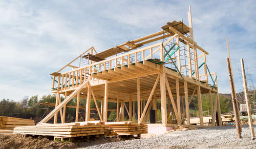 Framing of a new wooden house under construction