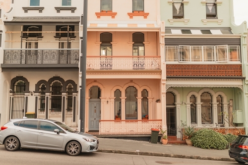 Terraced residential houses on a sloped street | Ultratech